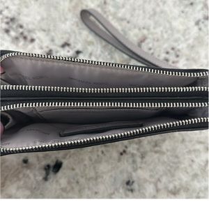 MK Wristlet on jet set travel color